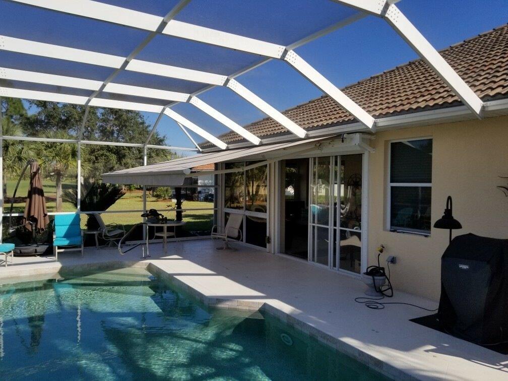 Swimming Pool Area Retractable Awning over Shutters — Fort Myers, FL — Accent Awning Company